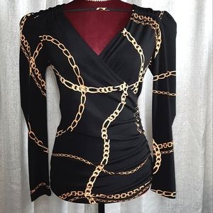 BOLD ELEMENTS CUT TO CURVE LONG SLEEVES V-NECK BLOUSE BLACK AND GOLD SM